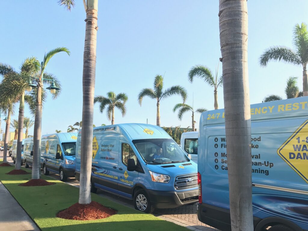 1-800 Water Damage vans lined up franchisee of the year